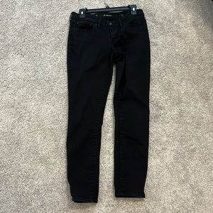 Black mid rise skinny jeans